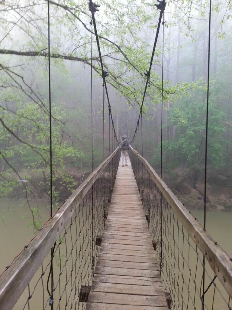 Sheltowee_Trace_Red_River_Suspension_Bridge Foggy suspension bridge on the Sheltowee Trace Trail, Red River Gorge, KY. Hiking adventure.
